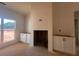 Bright living room featuring a fireplace and built-in cabinets at 610 Presley Farm Pkwy, Rockmart, GA 30153