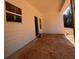 Covered porch with white siding and view of wooded area at 610 Presley Farm Pkwy, Rockmart, GA 30153