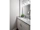 Cozy bathroom with granite counters, white cabinets, and a decorative plant at 1223 Whitlock Ridge Sw Dr, Marietta, GA 30064