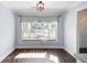 Dining room with bay window, bench seating, and hardwood floors at 1223 Whitlock Ridge Sw Dr, Marietta, GA 30064