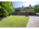 Backyard view of property with green grass and rear home view at 1223 Whitlock Ridge Sw Dr, Marietta, GA 30064