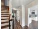 Hallway with staircase and view of updated kitchen at 1223 Whitlock Ridge Sw Dr, Marietta, GA 30064