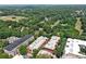 Stunning aerial view overlooking lush greenery and a serene lake, offering a peaceful and picturesque setting at 273 12Th Ne St # 114, Atlanta, GA 30309