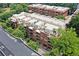 Community complex featuring red brick construction and mature landscaping at 273 12Th Ne St # 114, Atlanta, GA 30309
