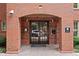 Inviting brick building entrance with a classic arched doorway, adding a touch of elegance and sophistication at 273 12Th Ne St # 114, Atlanta, GA 30309
