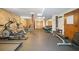 Community gym featuring workout equipment and fitness rules at 273 12Th Ne St # 114, Atlanta, GA 30309