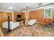 Common area with tile flooring, brick walls, and comfortable seating at 273 12Th Ne St # 114, Atlanta, GA 30309