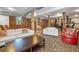 Spacious common area with comfortable seating and brick pillars at 273 12Th Ne St # 114, Atlanta, GA 30309