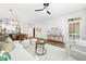 Cozy living room with a modern ceiling fan, neutral tones, and stylish decor at 273 12Th Ne St # 114, Atlanta, GA 30309