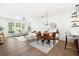 Open-concept living area featuring dining space and kitchen access at 273 12Th Ne St # 114, Atlanta, GA 30309