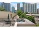 Rooftop patio perfect for lounging while enjoying beautiful city views at 273 12Th Ne St # 114, Atlanta, GA 30309