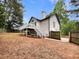 Spacious backyard with a large deck provides ample space for outdoor entertaining and relaxation at 339 Warrenton Dr, Douglasville, GA 30134