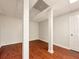 The basement area features vinyl floors, pillars, and drop ceiling. Customizable for various uses at 339 Warrenton Dr, Douglasville, GA 30134