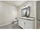 Bathroom featuring a vanity with granite counters, a toilet, and tile flooring at 339 Warrenton Dr, Douglasville, GA 30134