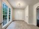 Bright dining area with large windows providing ample natural light and tiled flooring at 339 Warrenton Dr, Douglasville, GA 30134