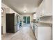 Modern kitchen featuring stainless steel appliances, granite countertops, and white cabinetry, perfect for culinary enthusiasts at 339 Warrenton Dr, Douglasville, GA 30134