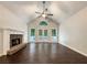 Bright living room featuring vaulted ceilings and a stone fireplace at 339 Warrenton Dr, Douglasville, GA 30134