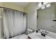 Cozy bathroom with shower-tub combination with a large mirror over the single sink at 3565 Hickory Branch Trl, Suwanee, GA 30024