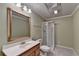 Bathroom with a shower, tile floors, and a vanity with storage at 3565 Hickory Branch Trl, Suwanee, GA 30024