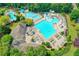 Community pool complex with a large pool, kiddie pool, water slide, and plenty of seating at 3565 Hickory Branch Trl, Suwanee, GA 30024