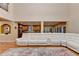 Bright living room featuring a large white sectional sofa and open access to the kitchen area at 3565 Hickory Branch Trl, Suwanee, GA 30024