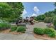 Community playground featuring slides, play structures, benches, and mature landscaping at 3565 Hickory Branch Trl, Suwanee, GA 30024