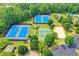 Community amenities include tennis courts, a sand volleyball court, and a parking area at 3565 Hickory Branch Trl, Suwanee, GA 30024