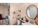 Cozy bathroom featuring a unique decorative mirror and compact vanity at 4256 Village Square Ln, Stone Mountain, GA 30083