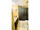 Well-lit bathroom with a sink, toilet, and shower/tub combo at 4256 Village Square Ln, Stone Mountain, GA 30083