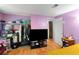 Functional bedroom with closet, laminate floors, and neutral walls at 4256 Village Square Ln, Stone Mountain, GA 30083