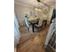 Dining room with a modern light fixture and matching chairs at 190 Grayland Creek Dr, Lawrenceville, GA 30046