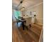 Dining room with a modern light fixture and matching chairs at 190 Grayland Creek Dr, Lawrenceville, GA 30046