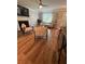 Cozy living room featuring hardwood floors, a fireplace, and natural light at 190 Grayland Creek Dr, Lawrenceville, GA 30046