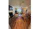 Cozy living room featuring hardwood floors, a fireplace, and natural light at 190 Grayland Creek Dr, Lawrenceville, GA 30046