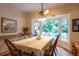 Cozy dining area with a bay window that brings in loads of sunlight at 3833 Savannah E Sq, Atlanta, GA 30340
