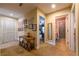 Hallway with natural light, and access to a full bathroom, and bedroom with a ceiling fan at 3833 Savannah E Sq, Atlanta, GA 30340