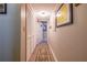 Hallway with closet space, carpet floors, and access to other rooms at 3833 Savannah E Sq, Atlanta, GA 30340