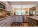 Charming kitchen with stainless steel appliances, ample counter space, and bright natural light at 3833 Savannah E Sq, Atlanta, GA 30340