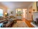 Comfortable living room features a bar area, hardwood floors, and neutral decor at 3833 Savannah E Sq, Atlanta, GA 30340