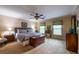 Inviting main bedroom with a ceiling fan and two windows, perfect for relaxation at 3833 Savannah E Sq, Atlanta, GA 30340