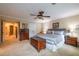 Comfortable main bedroom with a soft carpet, ceiling fan, and a calming atmosphere at 3833 Savannah E Sq, Atlanta, GA 30340