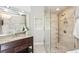 Bathroom with a walk-in shower, vanity, and modern fixtures at 3837 Fenway Xing, Marietta, GA 30062