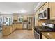 Well-equipped kitchen with stainless steel appliances and granite countertops at 3837 Fenway Xing, Marietta, GA 30062