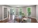 Bright home office with French doors and hardwood floors at 3837 Fenway Xing, Marietta, GA 30062