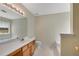 Bathroom with a double sink vanity, toilet, and a tub at 424 Yellow River Walk, Lawrenceville, GA 30043