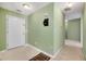 Entry hallway with a mail slot and access to various rooms at 424 Yellow River Walk, Lawrenceville, GA 30043