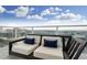 Inviting balcony seating area with city views and modern design at 45 Ivan Allen Jr Blvd # 2203, Atlanta, GA 30308