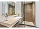 Bathroom with glass shower and vanity, featuring great views and an elegant design at 45 Ivan Allen Jr Blvd # 2203, Atlanta, GA 30308