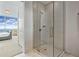 Contemporary bathroom design with glass enclosed shower and a view to bedroom at 45 Ivan Allen Jr Blvd # 2203, Atlanta, GA 30308