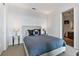 Modern bedroom with view to ensuite bathroom, offering style and convenience at 45 Ivan Allen Jr Blvd # 2203, Atlanta, GA 30308